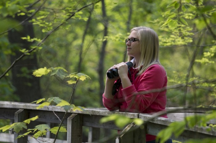 birder with binoculars