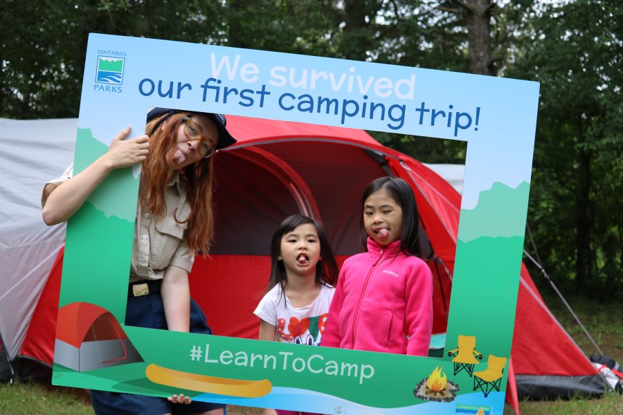 Learn to Camp participants in photo frame