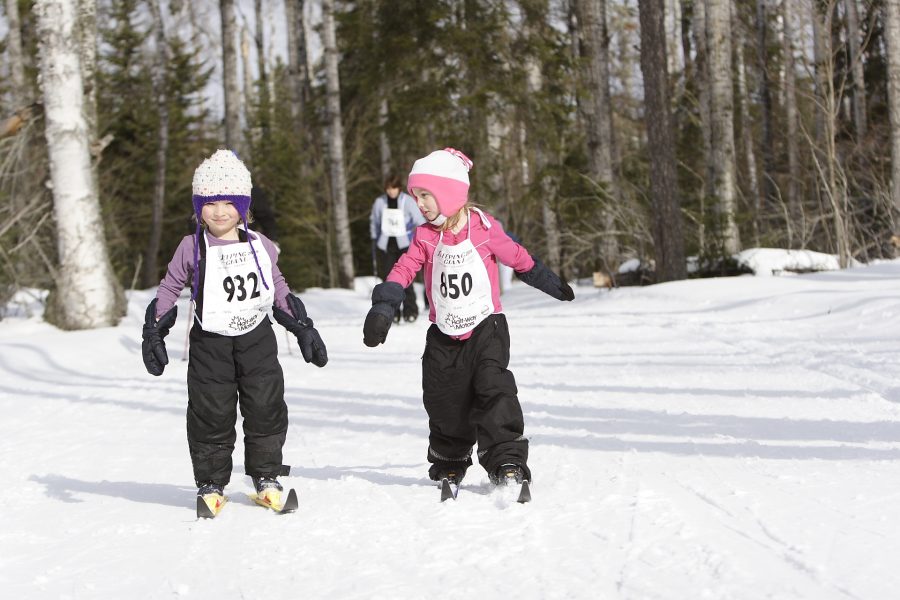 two girls skiing