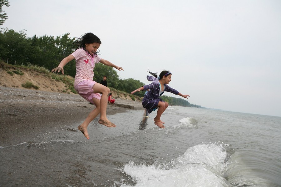 kids jumping into water