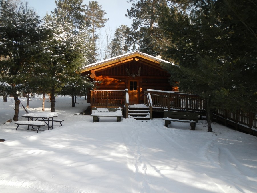 quetico back country cabin in winter -- showing front porch.