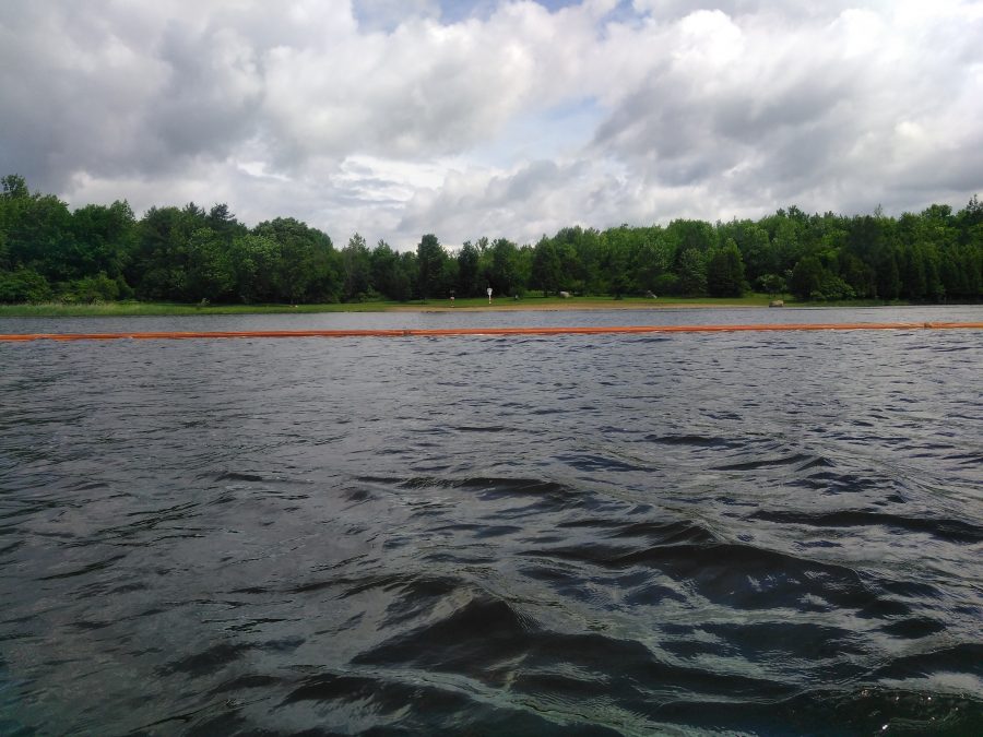 an orange barrier in water