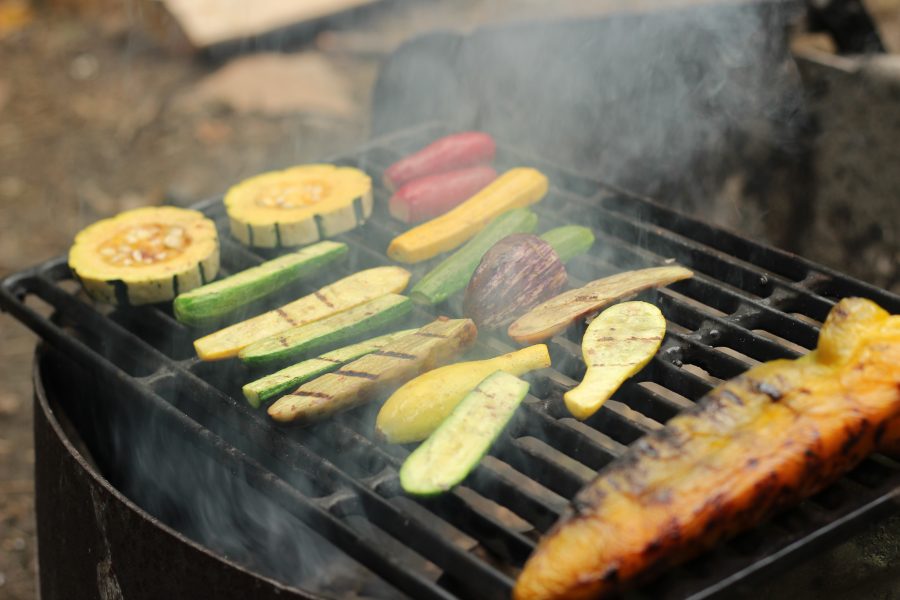 veggies cooking on campfire grill