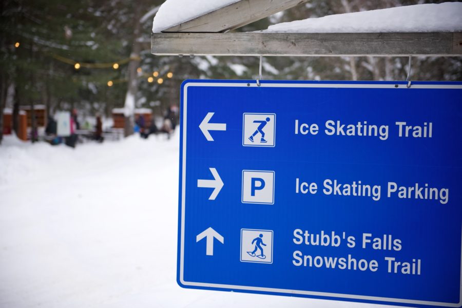 Blue ice skating trail sign