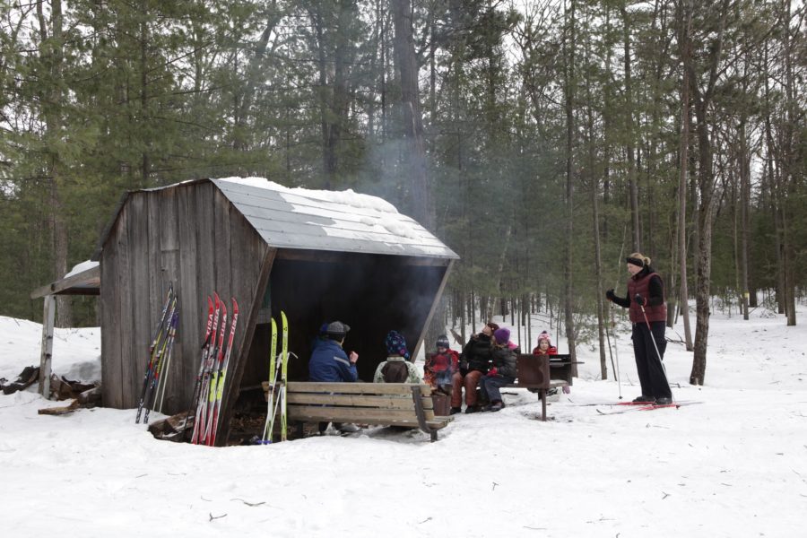 warm up hut with skiers
