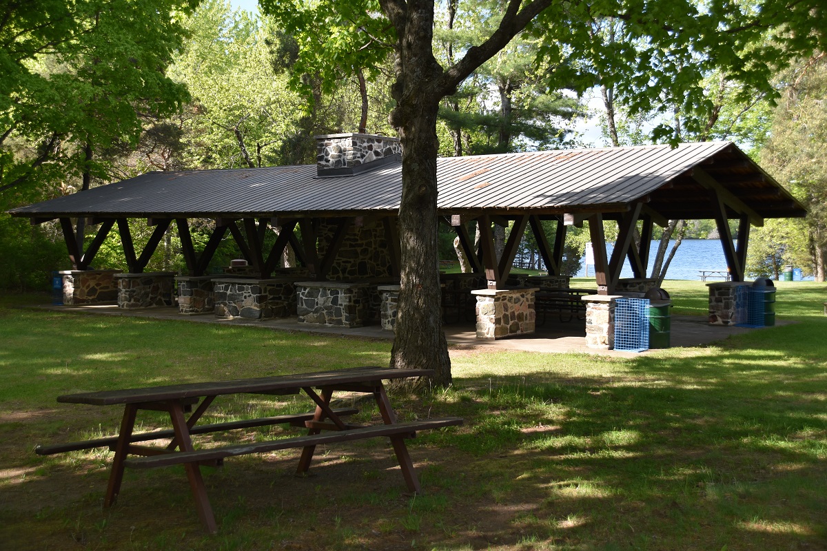 picnic shelter by lake