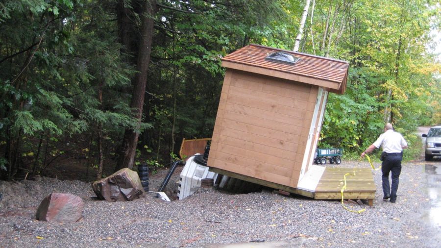 Outhouse tipping forward