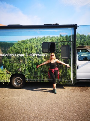 woman standing in front of Ontario Parks RV