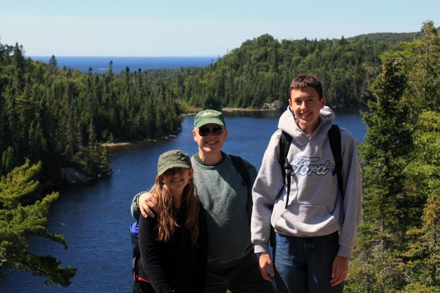 Kelly, Joey, and their dad at the lookout on the Orphan Lake Trail