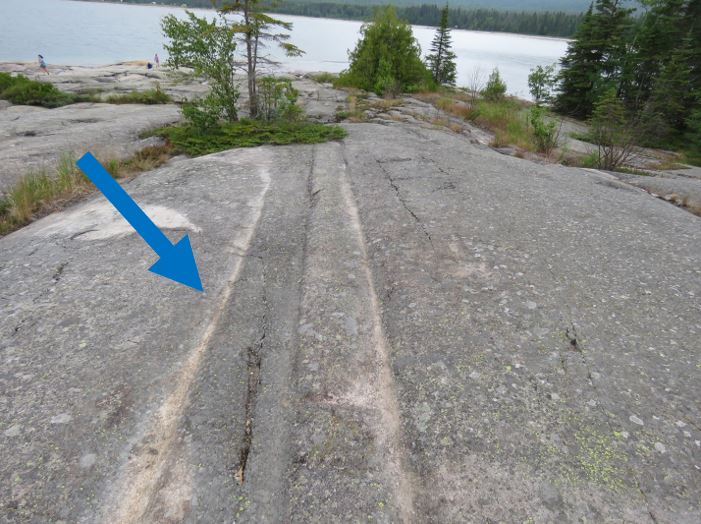 Glacial striations headed towards the water.