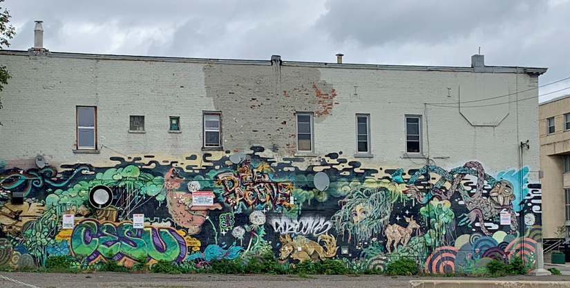 Mural on side of building. 