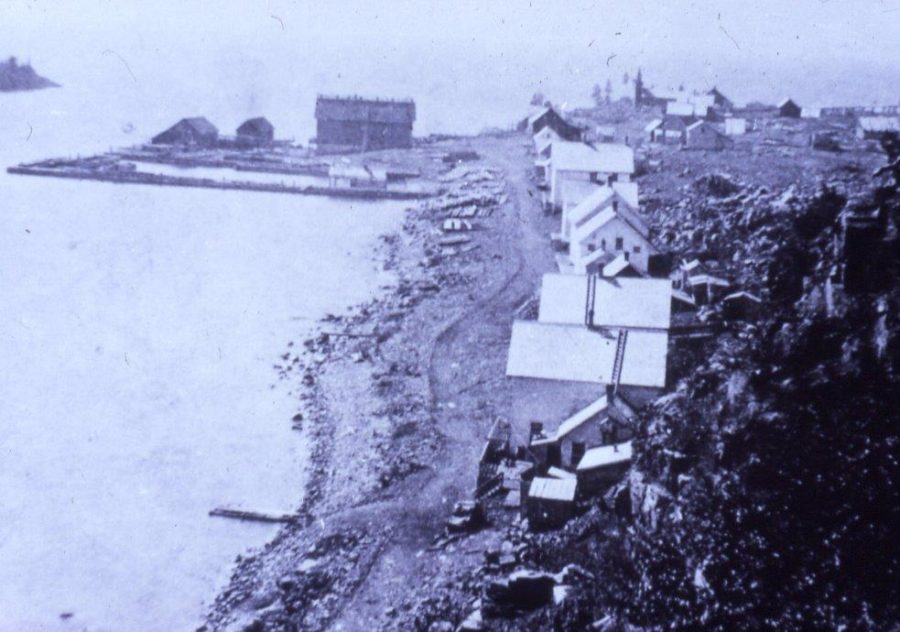 Historical photo of the shoreline of the mining town.