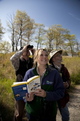 birders on a fall trail at Rondeau