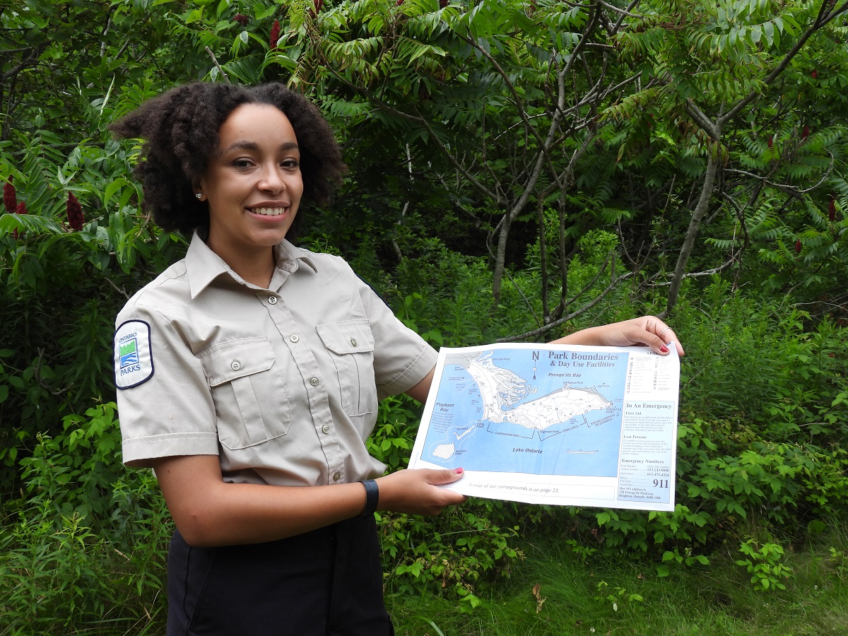 park ranger showing map of Presqu'ile