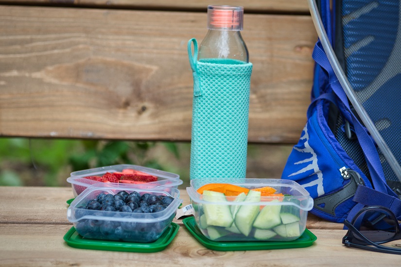 Snacks and water in reusable containers.