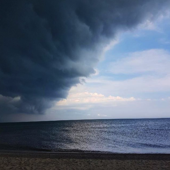 storm rolling in over beach
