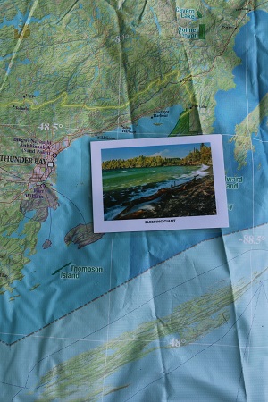 Postcard of Sleeping Giant on map. 