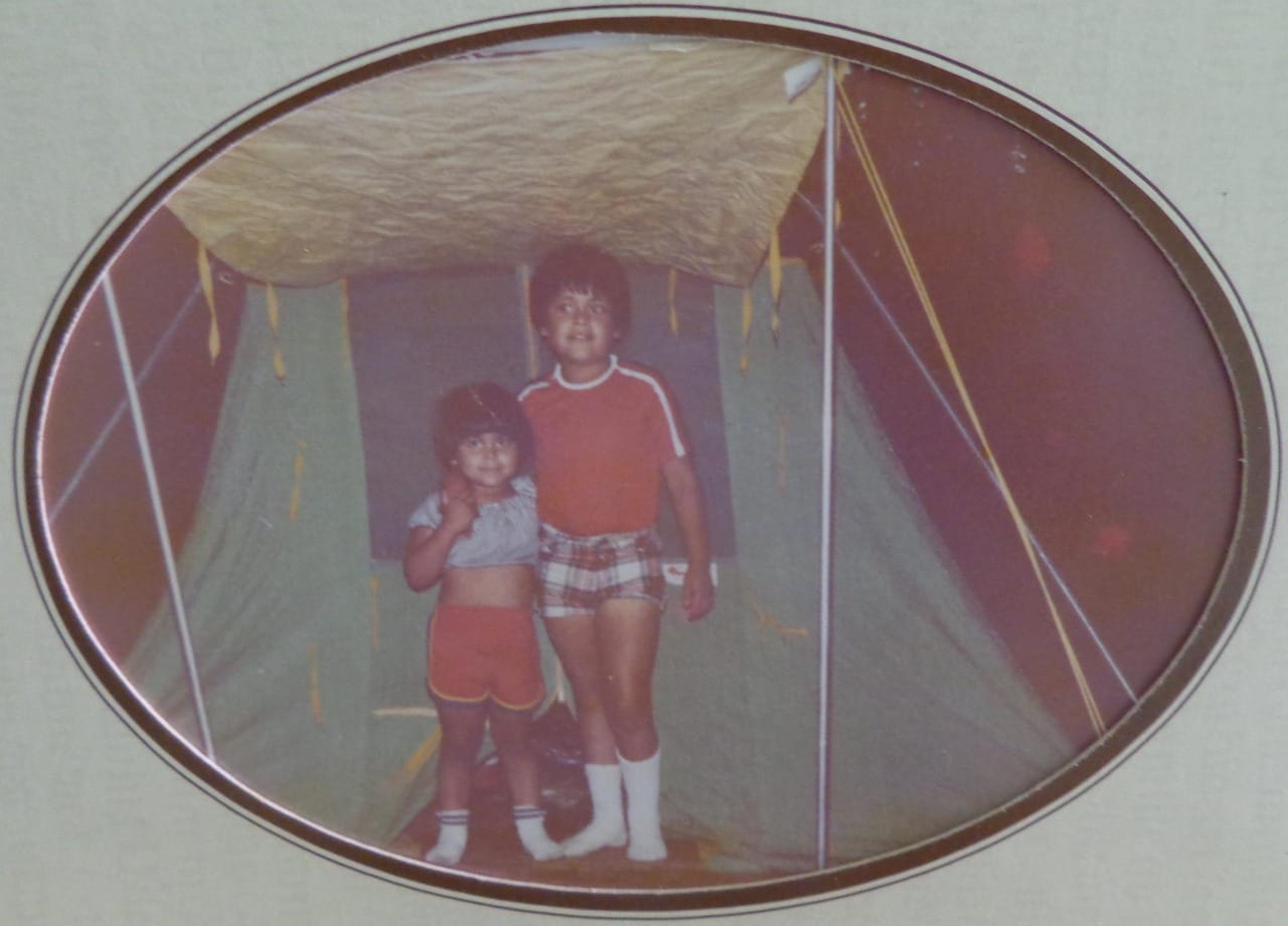 two children in tent
