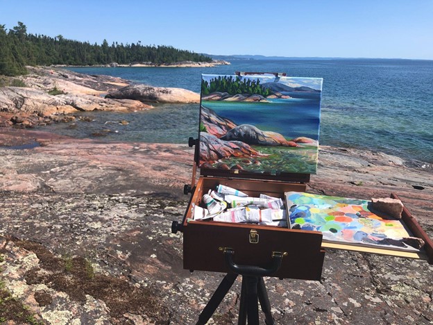 view of painting on easel in nature