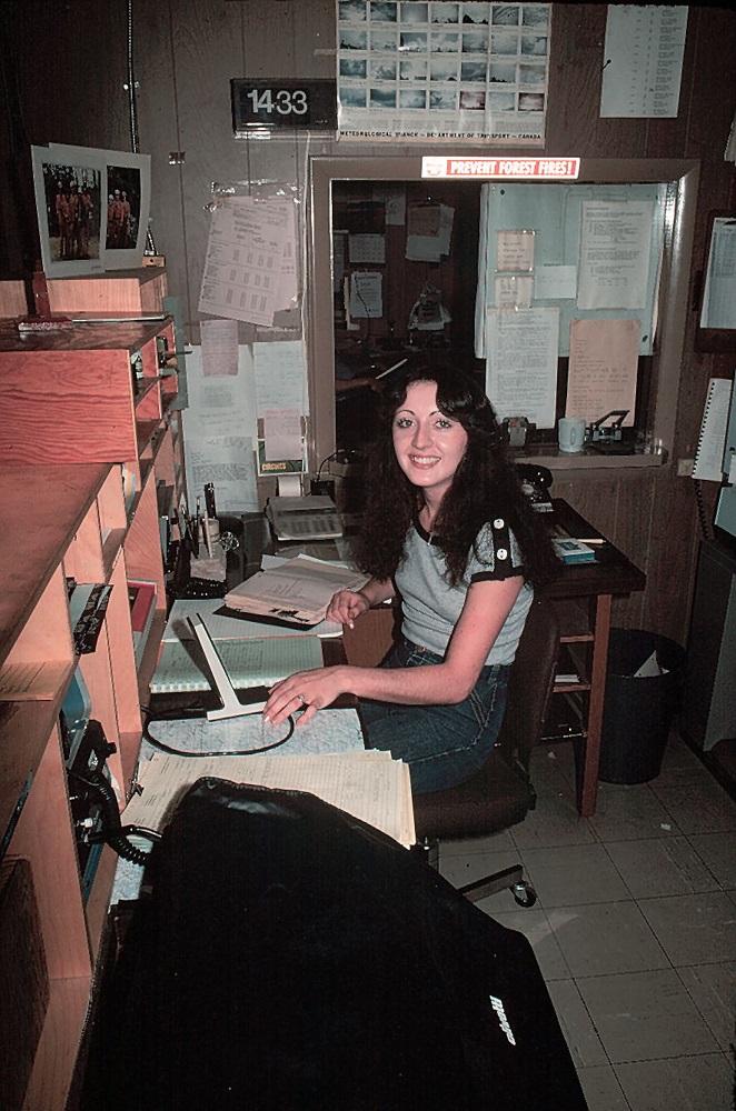 photo of staff at desk