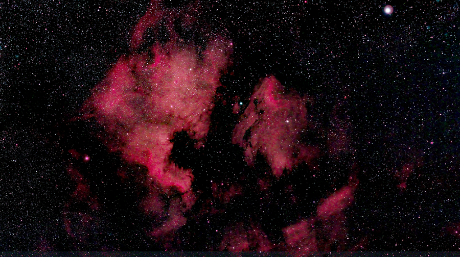 red gases on black starry sky