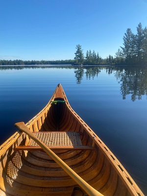 view of lake from inside canoe