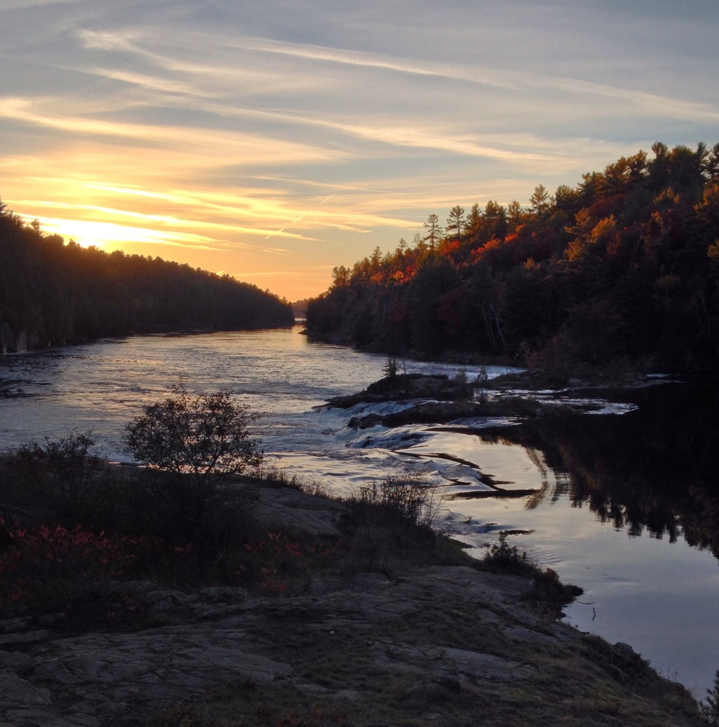 A sunset view of Recollet Falls from the historic portage