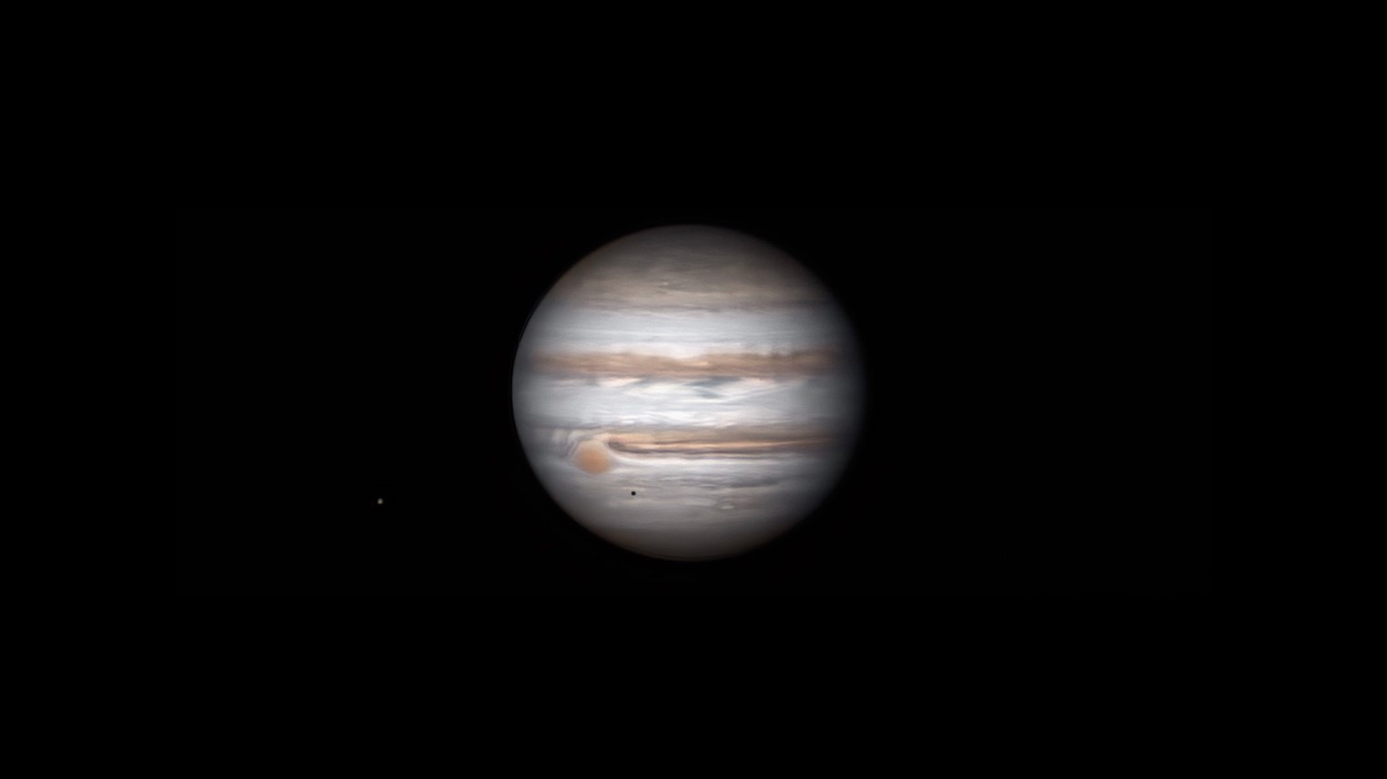 Jupiter with 6 moons in orbit
