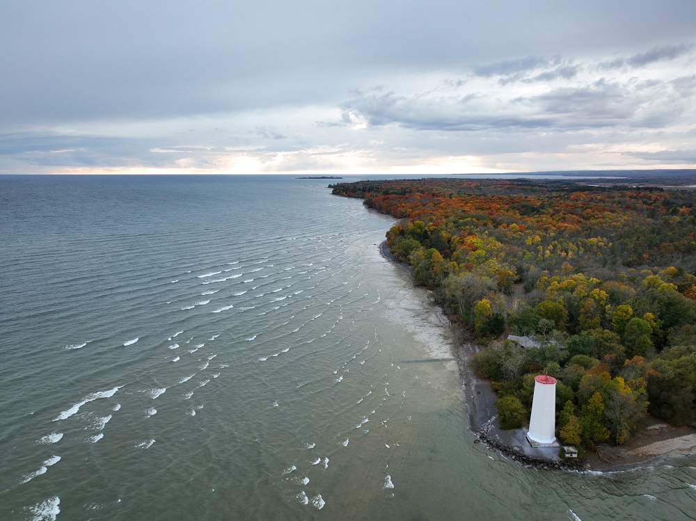 Aerial photo of lighthouse during Autumn