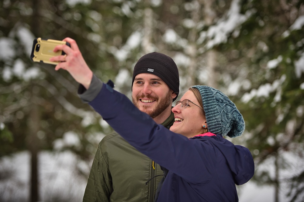 two people taking selfie