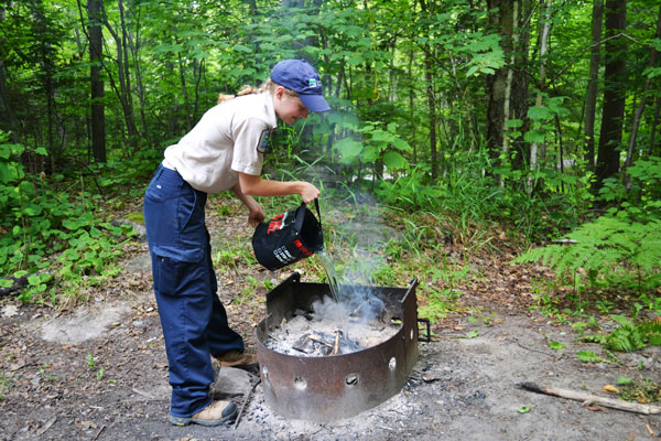 Extinguishing a campfire
