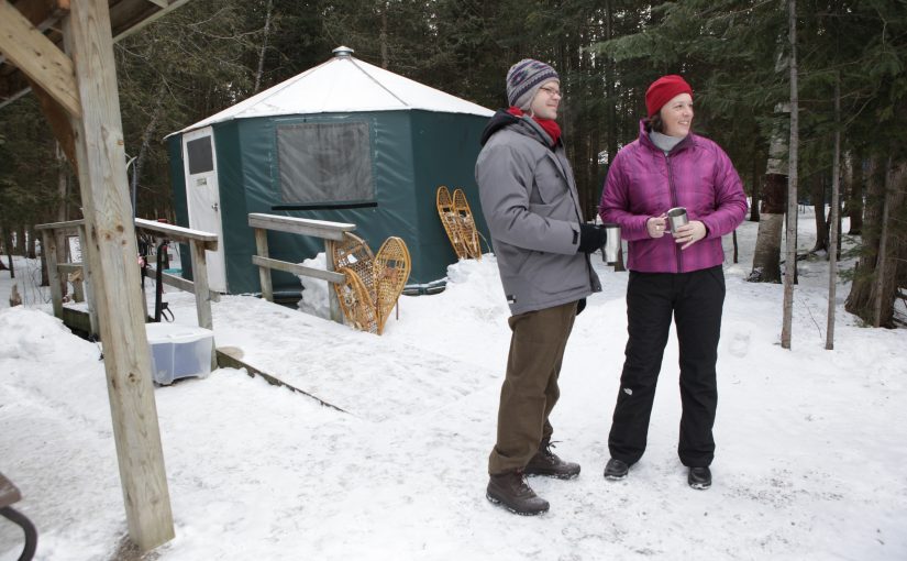 couple at winter yurt