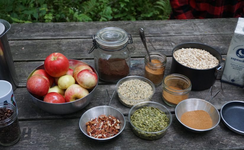 Ingredients on table: apples, nuts, oats, spices