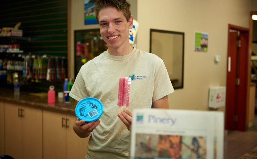 staff member holding popsicle