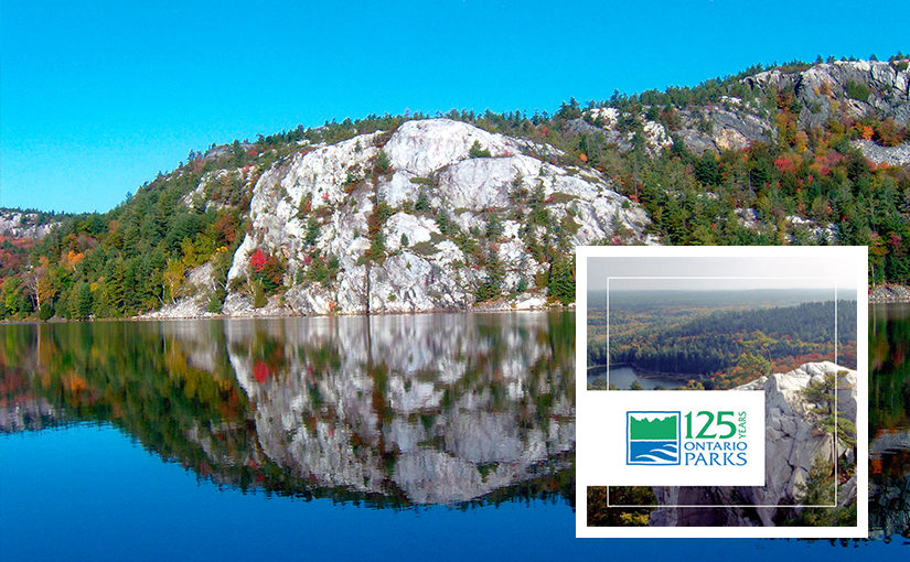 Killarney white cliffs reflecting in lake with OP125 logo