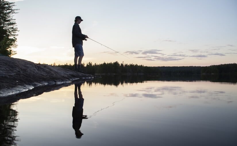 Man fishing on Cox Lake.